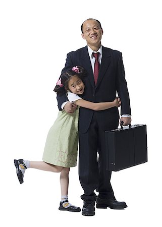 president director - Portrait of a girl hugging her father Stock Photo - Premium Royalty-Free, Code: 640-01366122