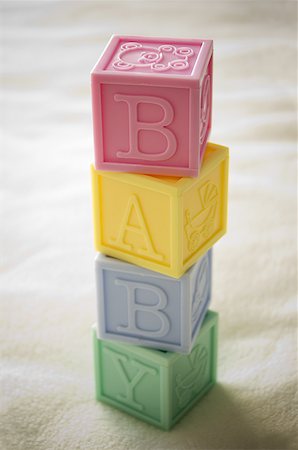 Close-up of a stack of alphabet blocks Foto de stock - Sin royalties Premium, Código: 640-01366164