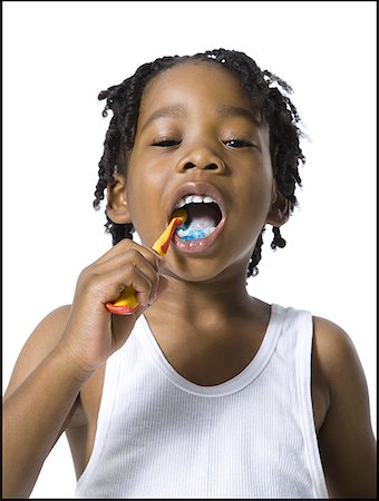 simsearch:640-03261285,k - Boy brushing his teeth Foto de stock - Sin royalties Premium, Código: 640-01366264