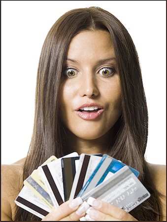 face card - Woman holding several credit cards Foto de stock - Sin royalties Premium, Código: 640-01366328