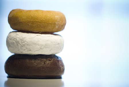 Close-up of a stack of donuts Foto de stock - Sin royalties Premium, Código: 640-01366577