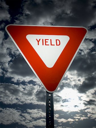 simsearch:6102-03905124,k - Low angle view of a yield sign Stock Photo - Premium Royalty-Free, Code: 640-01366596