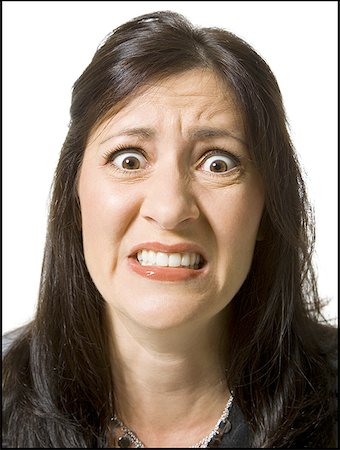 simsearch:640-02773811,k - Closeup of woman looking worried Stock Photo - Premium Royalty-Free, Code: 640-01360228