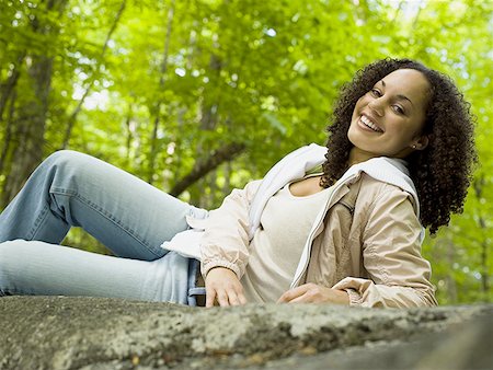 simsearch:640-02767900,k - Portrait of a young woman lying down Stock Photo - Premium Royalty-Free, Code: 640-01360258