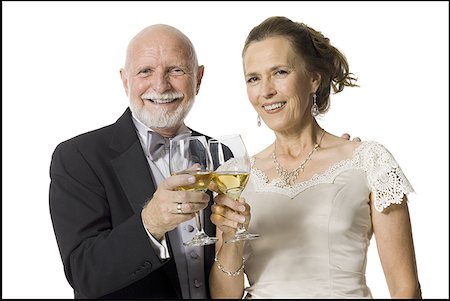 picture of elderly cheering - Portrait of a senior couple toasting with wine glasses Stock Photo - Premium Royalty-Free, Code: 640-01360308