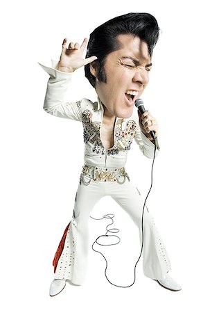 simsearch:640-02767608,k - Caricature d'un chant d'imitateur d'Elvis dans un microphone Photographie de stock - Premium Libres de Droits, Code: 640-01360315