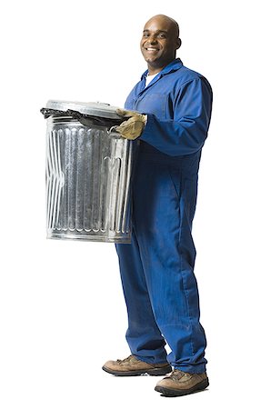 Garbage man with trash cans Stock Photo - Premium Royalty-Free, Code: 640-01360489