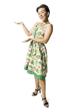 simsearch:640-01355807,k - Woman in floral dress gesturing Foto de stock - Sin royalties Premium, Código: 640-01360590