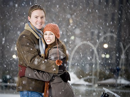 simsearch:640-02772458,k - Couple embracing outdoors in winter Stock Photo - Premium Royalty-Free, Code: 640-01360834