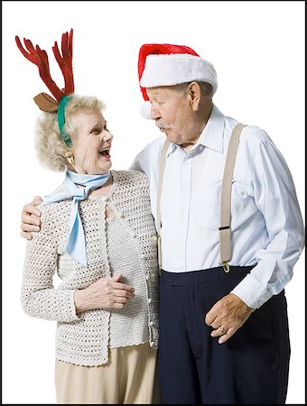 simsearch:640-01360365,k - Älteres Paar tragen weihnachtsmützen Stockbilder - Premium RF Lizenzfrei, Bildnummer: 640-01360955