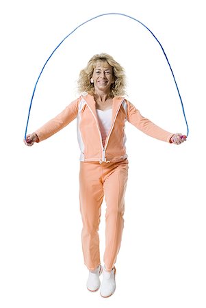 skipping ropes - Woman skipping Stock Photo - Premium Royalty-Free, Code: 640-01361385