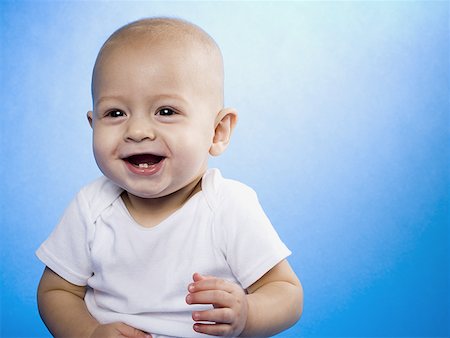simsearch:640-01351279,k - Baby smiling with copy space Stock Photo - Premium Royalty-Free, Code: 640-01361394