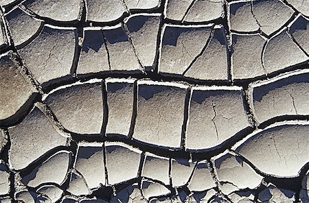 Close-up of cracked mud Foto de stock - Sin royalties Premium, Código: 640-01361476