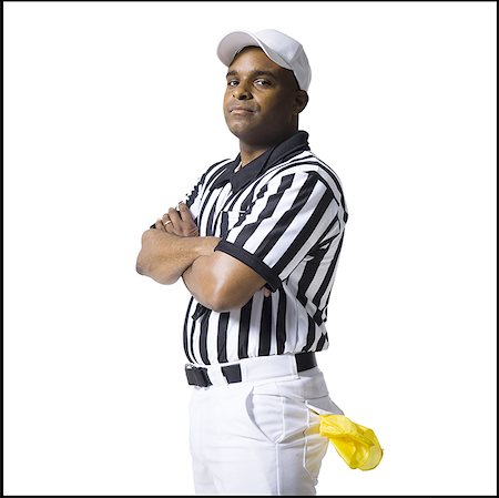 referee (male) - Referee standing with arms crossed Foto de stock - Sin royalties Premium, Código: 640-01361531