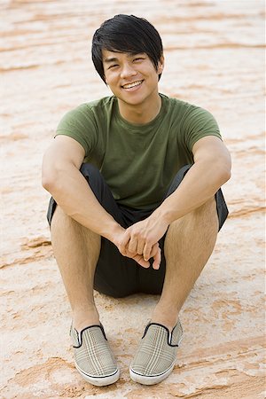 Portrait of a young man smiling Stock Photo - Premium Royalty-Free, Code: 640-01361687