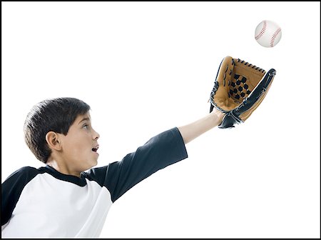 Gros plan d'un garçon qui joue au baseball Photographie de stock - Premium Libres de Droits, Code: 640-01361724