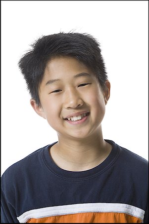 preteen boy happy white background - Portrait d'un garçon souriant Photographie de stock - Premium Libres de Droits, Code: 640-01361781