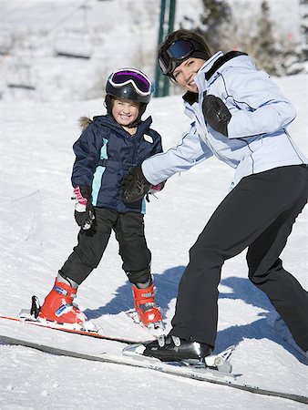 Woman and young girl skiing Stock Photo - Premium Royalty-Free, Code: 640-01362109
