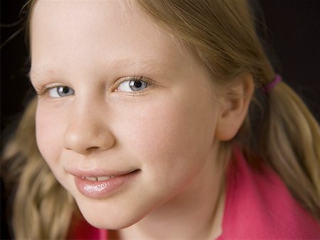 Portrait of a girl smiling Stock Photo - Premium Royalty-Free, Code: 640-01362170