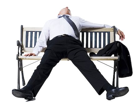 Businessman sleeping on a bench Stock Photo - Premium Royalty-Free, Code: 640-01362240