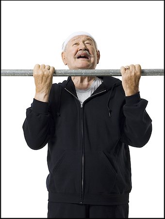 simsearch:640-01358490,k - Older man doing chin up exercises Stock Photo - Premium Royalty-Free, Code: 640-01362324