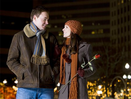 red scarf woman - Man and woman with red rose outdoors in winter Stock Photo - Premium Royalty-Free, Code: 640-01362446