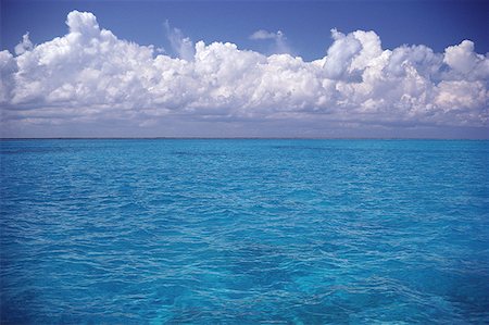 View of a blue sea with clouds overhead Stock Photo - Premium Royalty-Free, Code: 640-01362467