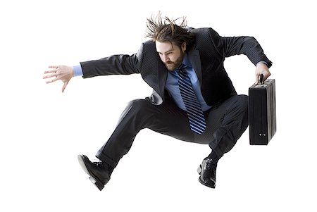 Man with briefcase leaping Foto de stock - Sin royalties Premium, Código: 640-01362538