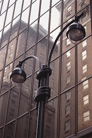 Low angle view of a lamppost outside a building Stock Photo - Premium Royalty-Free, Code: 640-01362650