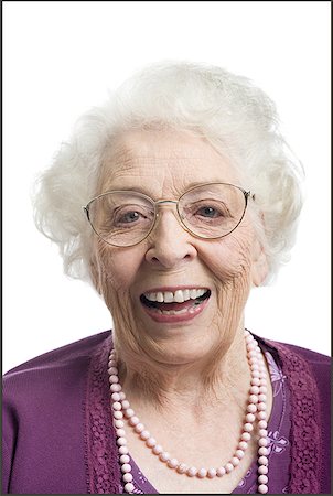 Portrait of a senior woman smiling Stock Photo - Premium Royalty-Free, Code: 640-01362666
