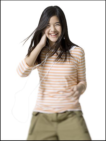 Portrait of a teenage girl dancing Stock Photo - Premium Royalty-Free, Code: 640-01362695