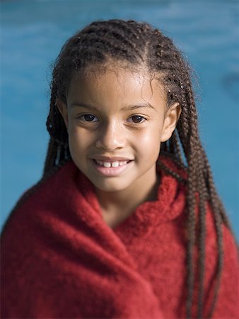 Portrait of a girl wrapped in a towel and smiling Stock Photo - Premium Royalty-Free, Code: 640-01362740