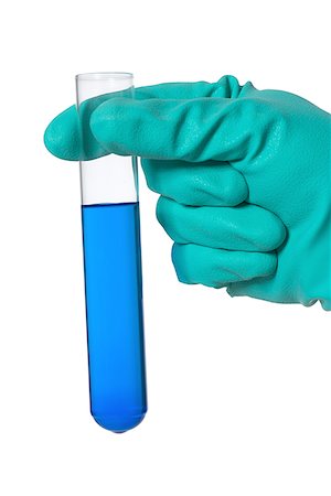 Person holding a test tube Stock Photo - Premium Royalty-Free, Code: 640-01362763