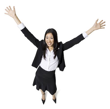 Businesswoman with arms up Stock Photo - Premium Royalty-Free, Code: 640-01362884