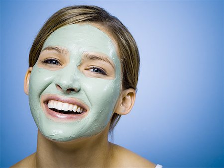 skin treatment medical - Woman with facial mask smiling with copy space Foto de stock - Sin royalties Premium, Código: 640-01363038