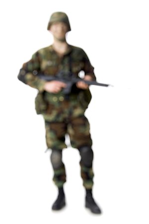 simsearch:640-01364108,k - Soldier holding a rifle Stock Photo - Premium Royalty-Free, Code: 640-01363222