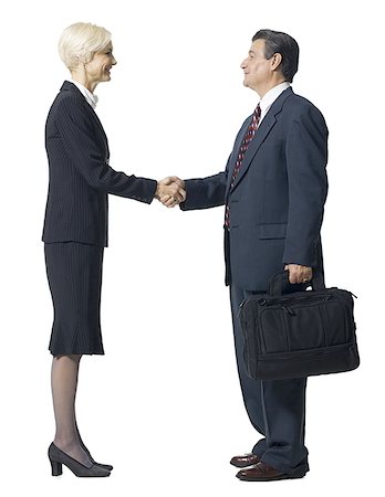 simsearch:640-02771838,k - Mature businessman and woman shaking hands Stock Photo - Premium Royalty-Free, Code: 640-01363361
