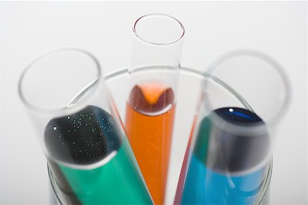 smaller - High angle view of liquid inside three test tubes Stock Photo - Premium Royalty-Free, Code: 640-01363410