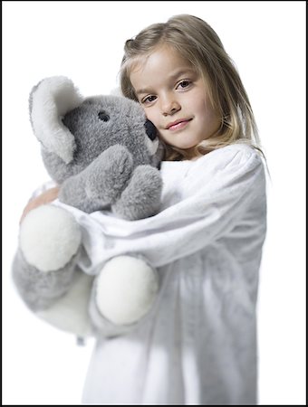 Portrait of a girl hugging a stuffed koala bear Foto de stock - Sin royalties Premium, Código: 640-01363620