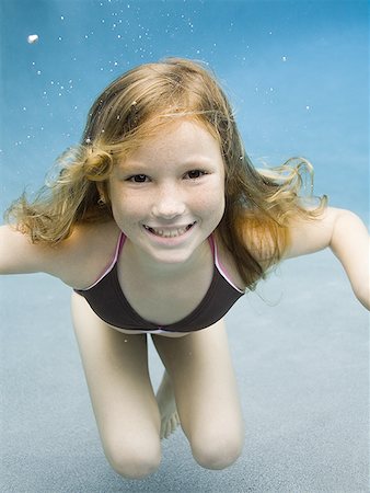 simsearch:640-02764438,k - Portrait of a girl swimming Stock Photo - Premium Royalty-Free, Code: 640-01363639