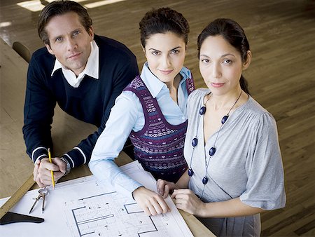 Portrait of three architects looking up Stock Photo - Premium Royalty-Free, Code: 640-01363630