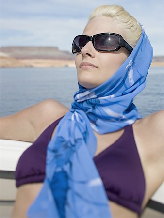 Close-up of a woman sunbathing Stock Photo - Premium Royalty-Free, Code: 640-01363724