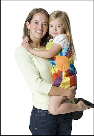 simsearch:640-02765964,k - Portrait of a mother smiling with her daughter Stock Photo - Premium Royalty-Free, Code: 640-01363774
