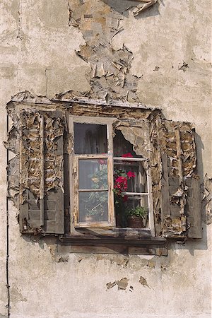 Low angle view of a dilapidated window Stock Photo - Premium Royalty-Free, Code: 640-01363849