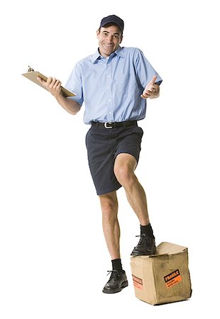 postbote (männlich) - Porträt einer mailman mit einer Tafel und einem Paket Stockbilder - Premium RF Lizenzfrei, Bildnummer: 640-01363840