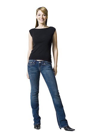 simsearch:640-01458458,k - Woman standing and smiling Stock Photo - Premium Royalty-Free, Code: 640-01458461