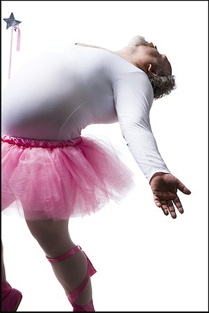 fat people tutu - Obese man in tutu with wand dancing Foto de stock - Sin royalties Premium, Código: 640-01458718