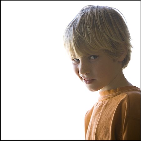 simsearch:640-01458500,k - Portrait of a boy making funny face Foto de stock - Sin royalties Premium, Código: 640-01459060