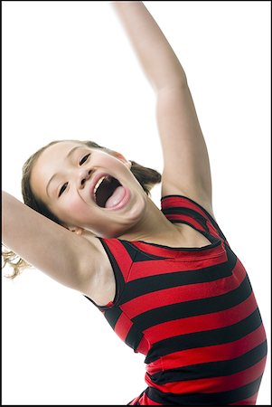 simsearch:640-01458889,k - Jeune fille dansant et souriant Photographie de stock - Premium Libres de Droits, Code: 640-01459087