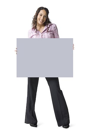 simsearch:640-01355807,k - Woman holding blank sign Foto de stock - Sin royalties Premium, Código: 640-01540408